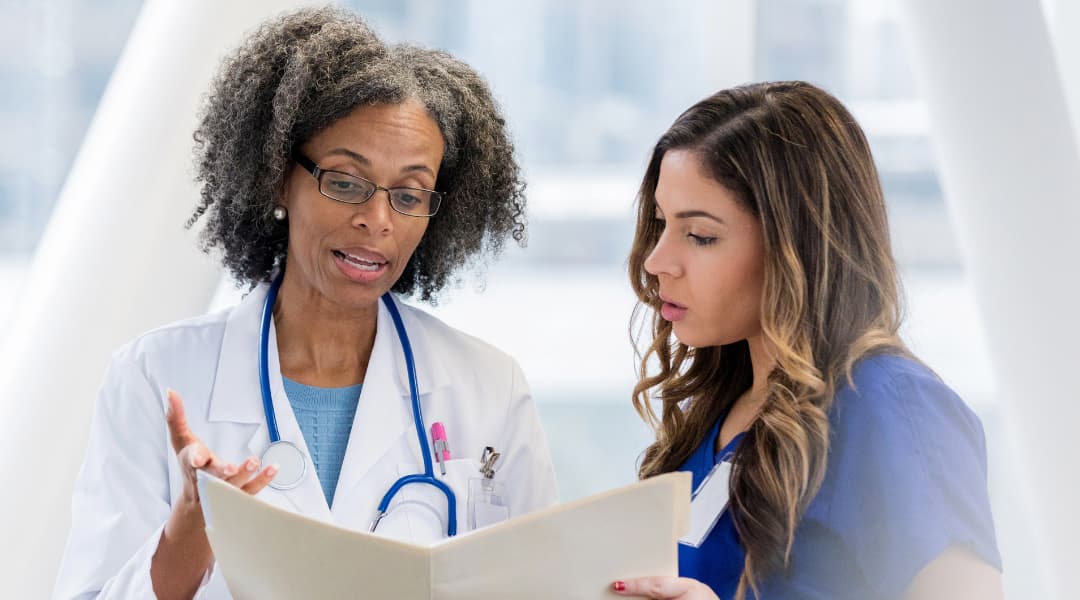 Well-organized shelf filled with books and decorative items